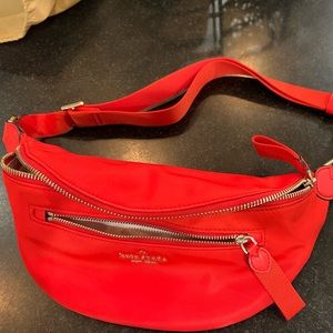 Red Kate spade belt bag.